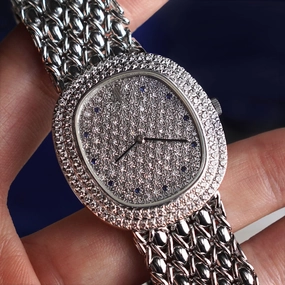Audemars Piguet Oval-shaped Wristwatch, Diamond Bezel and Pav Diamond Dial with Sapphires, White Gold