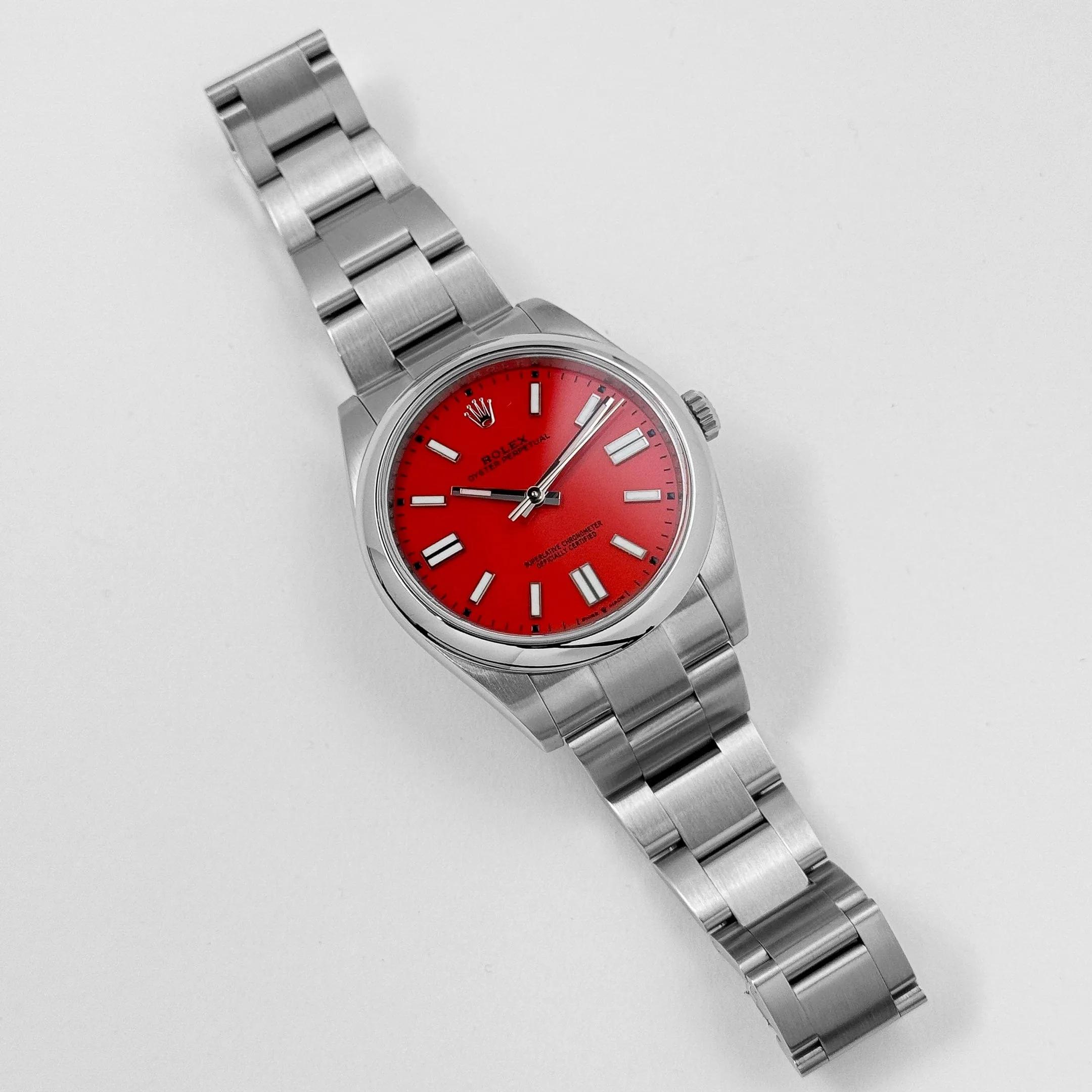 Rolex Oyster Perpetual 41 124300 Stainless Steel Red Dial (2021)
